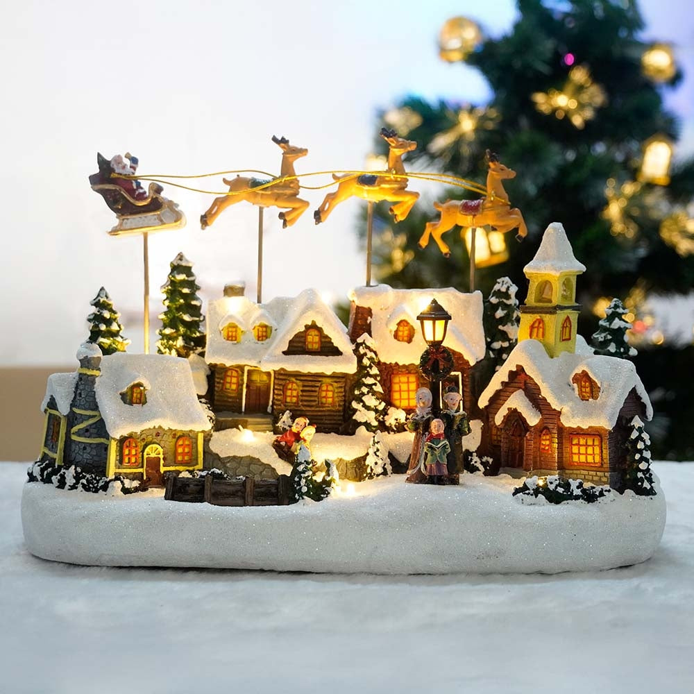 VILLAGE DE NOEL AVEC TRAINEAU VOLANT ANIME A PILES (3)