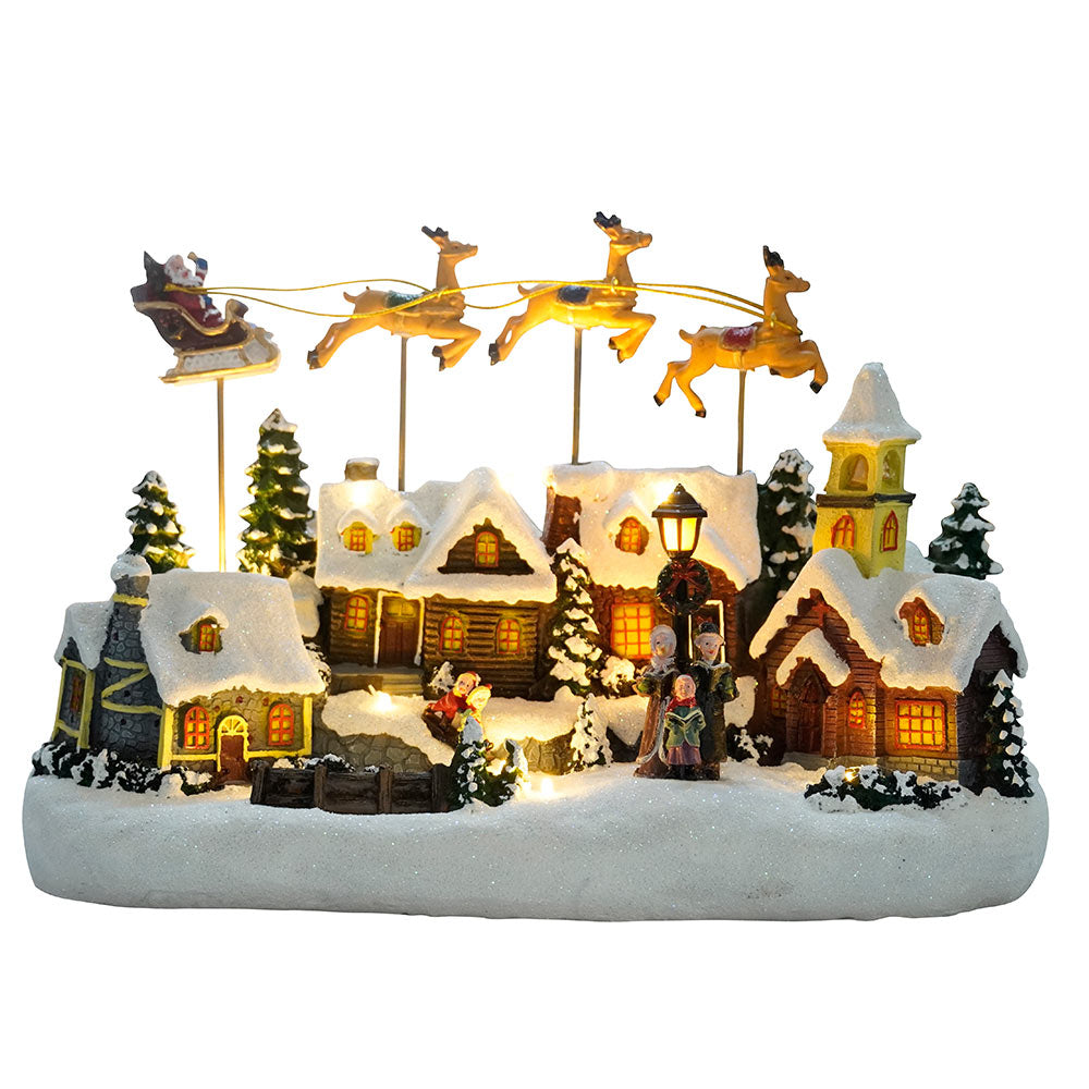 VILLAGE DE NOEL AVEC TRAINEAU VOLANT ANIME A PILES
