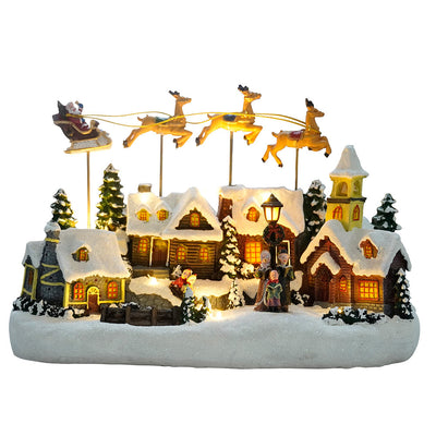 VILLAGE DE NOEL AVEC TRAINEAU VOLANT ANIME A PILES